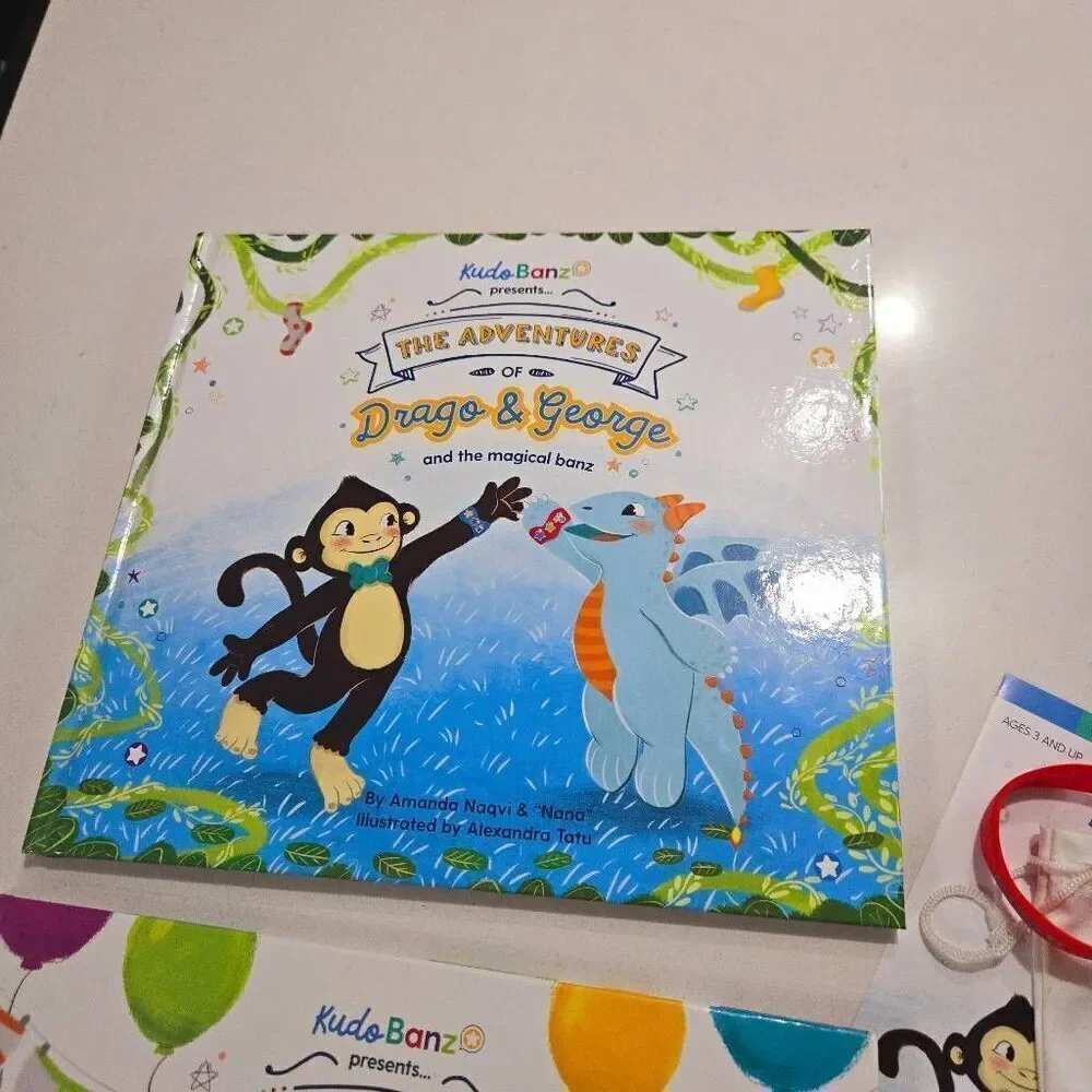 Kudo Banz Drago and George and The Potty Party book with Safari bag. Like new po